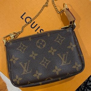 Authentic Louis Vuitton Mini Pochette ON HOLD